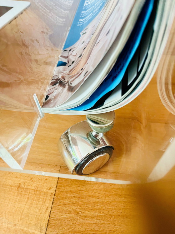 Image 1 of 80's Acrylic side table on wheels + reading material