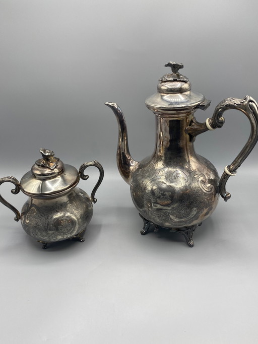 Verzilverde koffiepot en suikerpot set – Armand Frénais – decoratieve objecten
