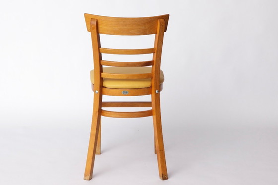 Image 1 of Vintage Beechwood Chair with Yellow Faux Leather Seat – 1960s/1970s German Mid-Century Modern