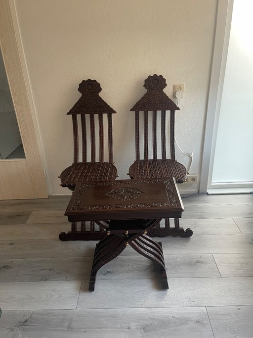 Pakistani Chiniot hand-carved rosewood chairs with Savonarola-inspired folding form