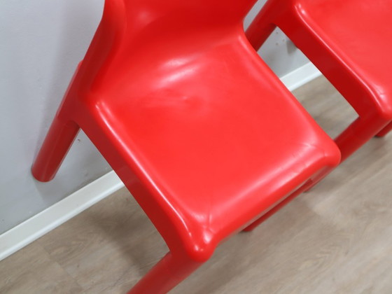 Image 1 of Set van twee Kartell Model 4875 stoelen uit de jaren 70, ontworpen door Carlo Bartoli, in rode kleur.