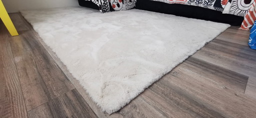 Superzacht beige tapijt