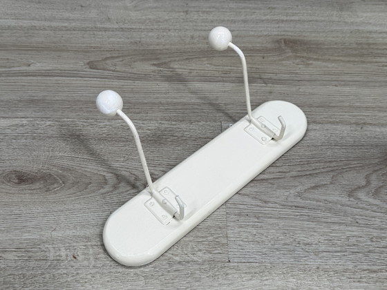Image 1 of Mid-century white coat rack with spherical hooks