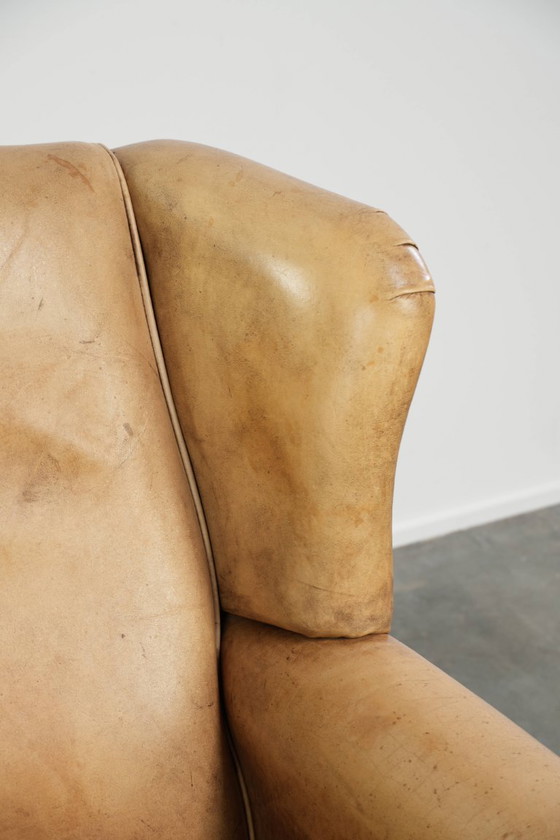 Image 1 of Lichte rundleren oorfauteuil met een goed zitcomfort
