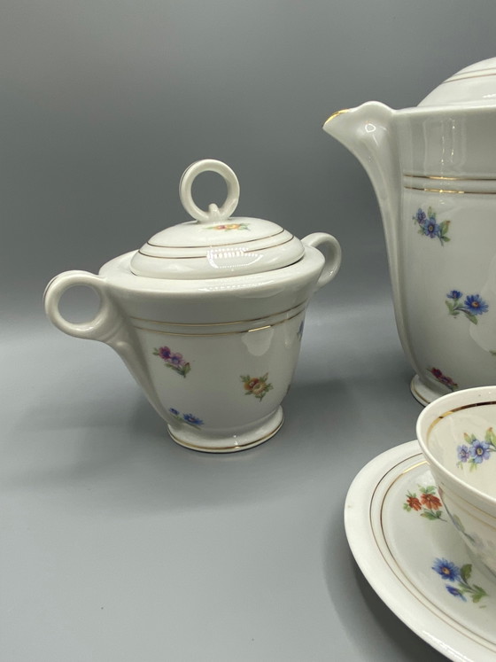 Cafetière, sucrier et tasse en porcelaine de Limoges - Petits motifs floraux et dorures – Objets déco (photo 3 of 8)