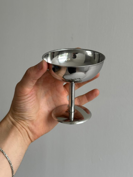 Image 1 of 8 bowls on stainless steel stand