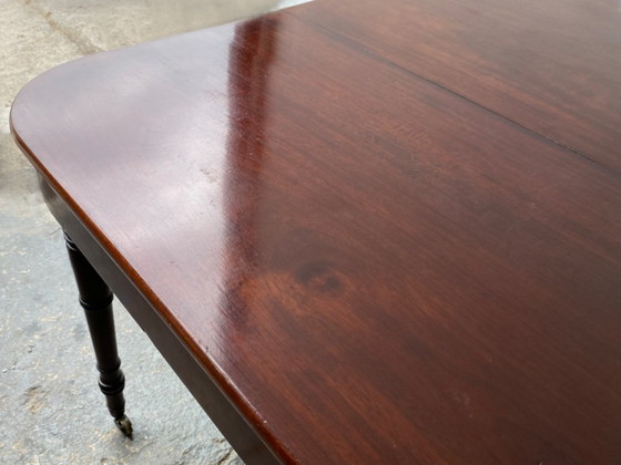 Image 1 of Table de salle à manger victorienne à rallonge en acajou avec pieds tournés et roulettes