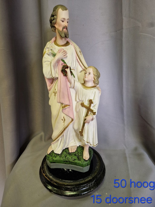 Christian Joseph with Jesus statue