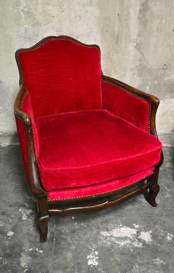 Image 1 of Par de sillones bergère estilo Luis XV en terciopelo rojo.
