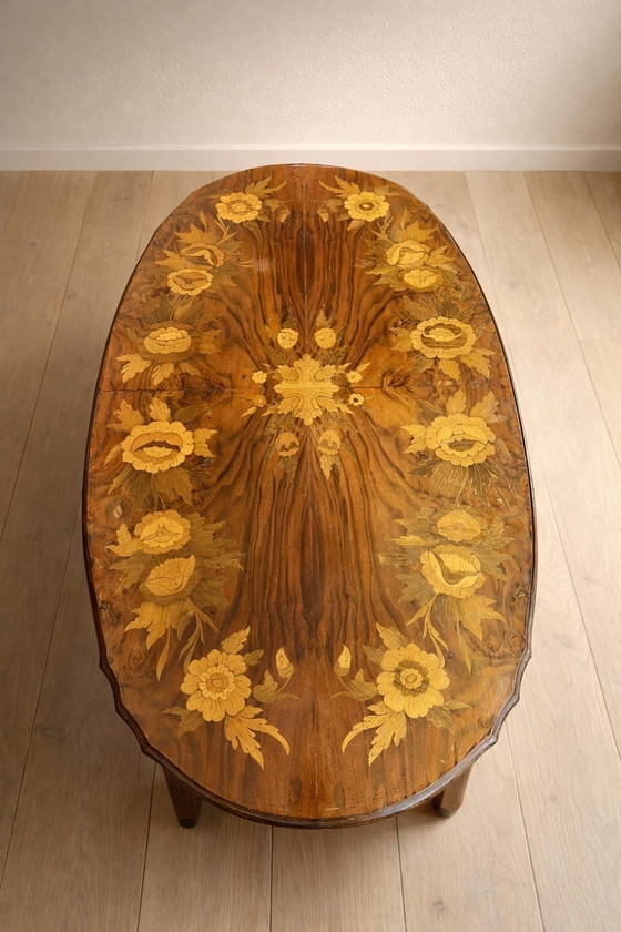 Image 1 of Vintage oval coffee table with marquetry top