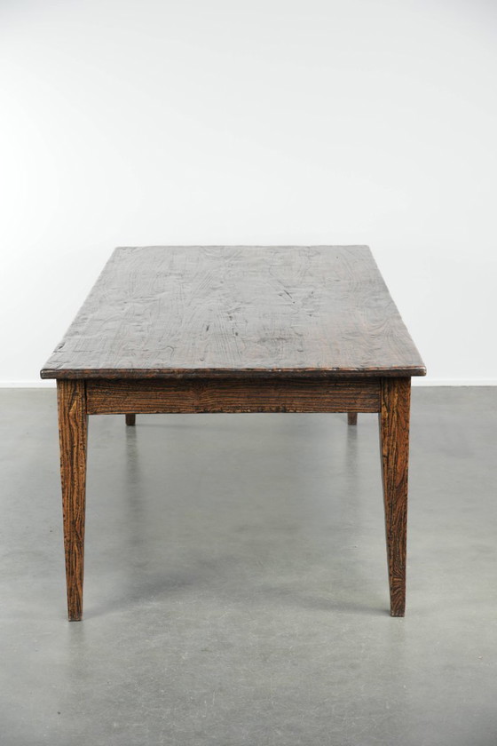 Image 1 of Grote boeren eettafel van sfeervol iepenhout met een prachtig patina uitgevoerd met drie lades
