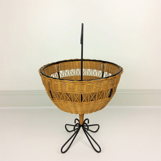 Image 1 of Vintage rattan basket on 4 black lacquered metal legs, 1950