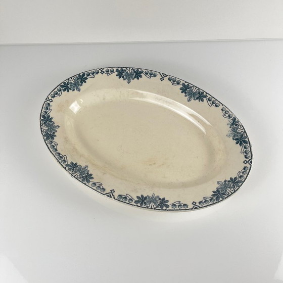 Image 1 of Plato ovalado, modelo "Túnez", de Longwy, finales del siglo XIX.