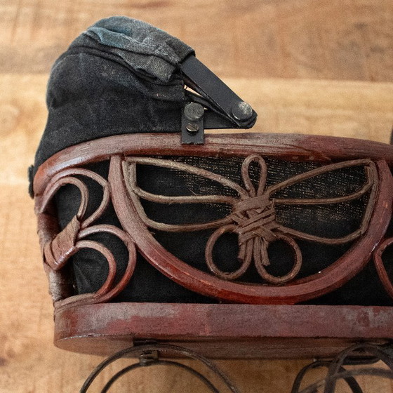 Image 1 of Antique Victorian-style doll pram