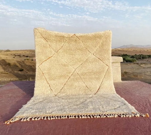 Alfombra de lana con patrón geométrico