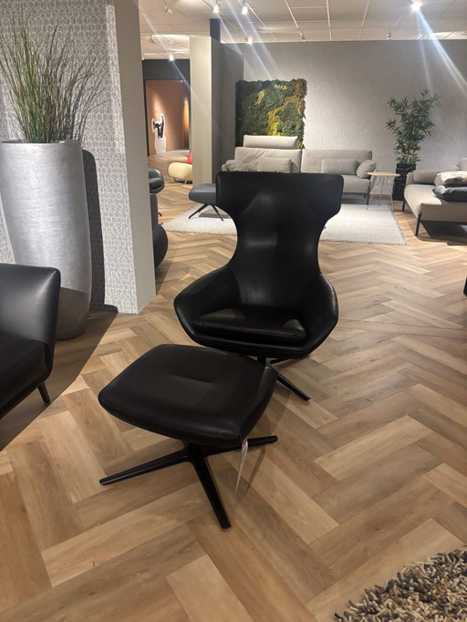 Leolux Caruzzo Plus armchair with ottoman