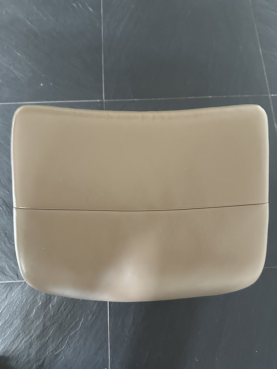 Image 1 of Taupe armchair with footstool