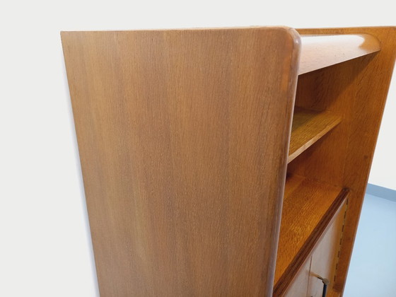 Image 1 of Meuble bibliothèque de rangement vintage René Gabriel style scandinave en bois de chêne des années 50