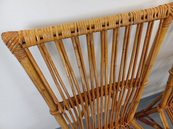 Image 1 of Suite de 4 chaises vintage Audoux Minet en rotin des années 50 60