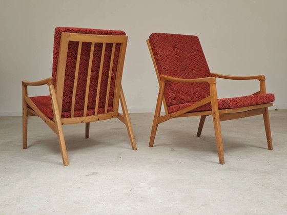Pair of Jiri Jiroutek red armchairs by Intérier Praha – Wood, Mid Century Modern (photo 12 of 13)