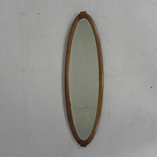 Oval mirror with cut edge, 1950s