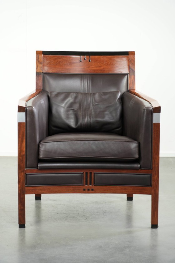 Image 1 of Luxe Schuitema Art Deco design set bestaande uit een fauteuil en hocker uit de Decoforma serie in chocolade bruin rundleer