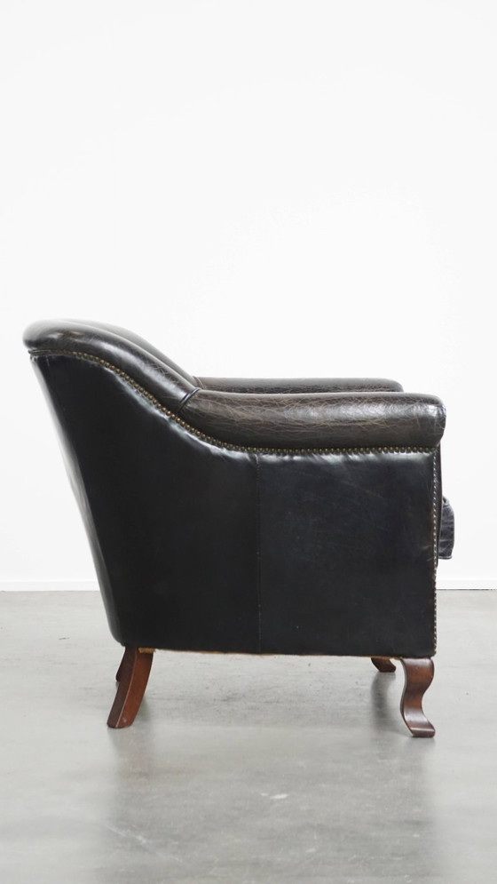 Image 1 of Zwarte generfde rundleren armchair/ fauteuil 