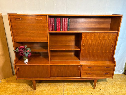 Danish-Style Mid Century Modern Teak Highboard by Elliotts of Newbury (Circa 1960)  A striking mid century modern teak highboard