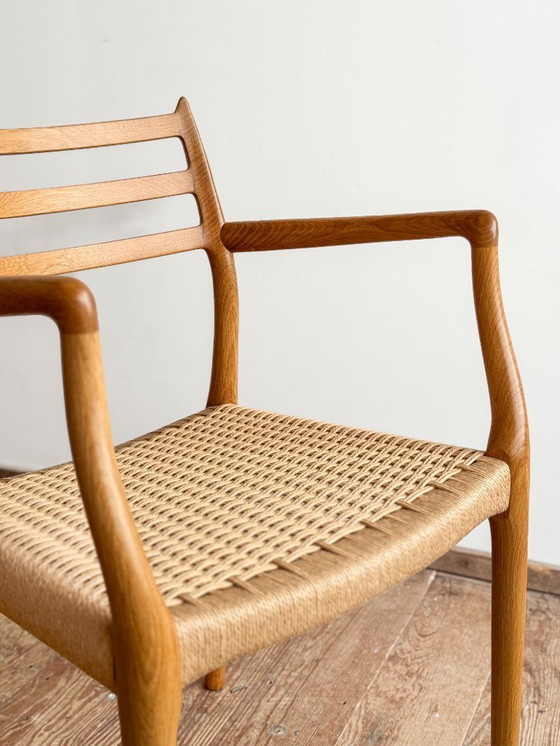 Image 1 of Esszimmerstuhl mit Armlehnen aus Eichenholz, Modell 62 für J.L. Moller