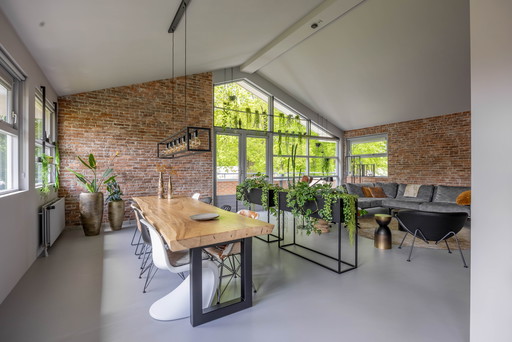 2 Room dividers made of black exposed metal with waterproof plant bags