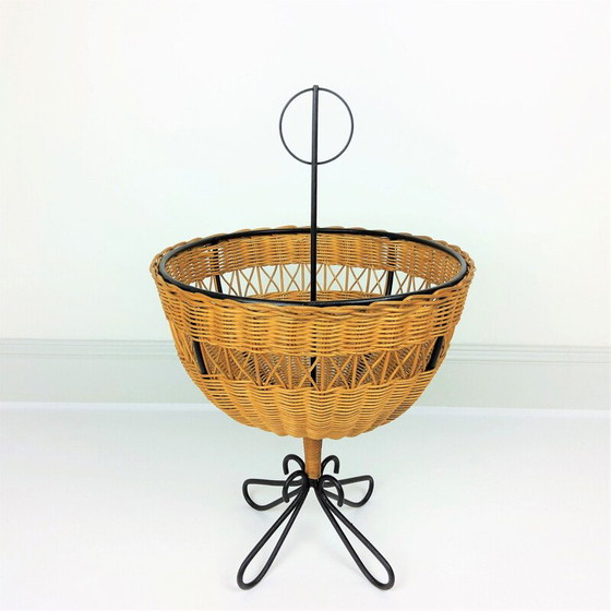 Image 1 of Vintage rattan basket on 4 black lacquered metal legs, 1950