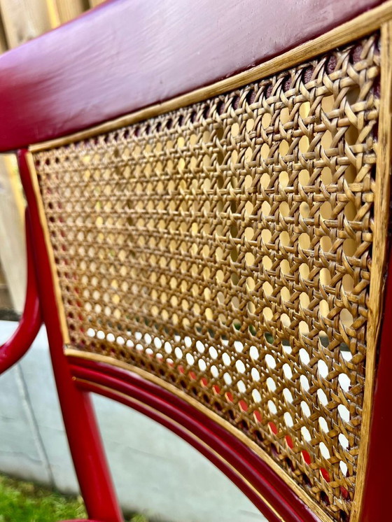 Image 1 of Vintage design stoel – rood & rotan – gerestyld door Ontwerpstudio Anna