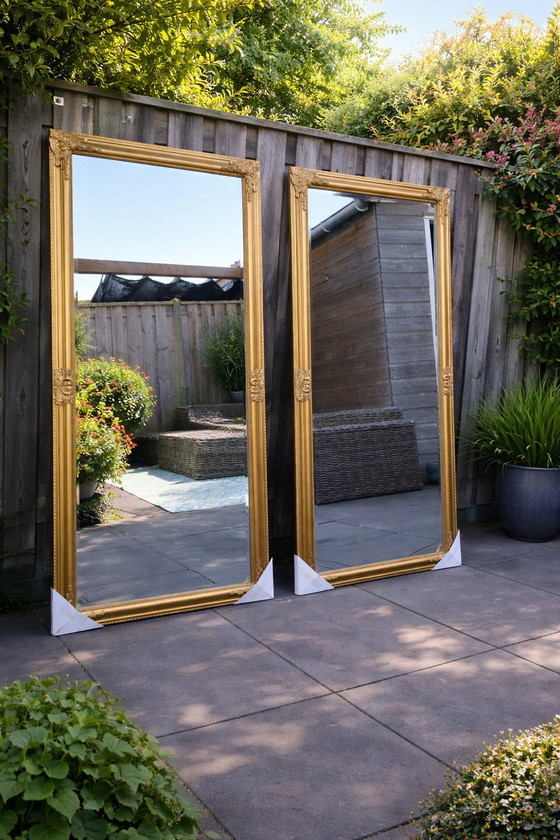 Image 1 of 2 große Spiegel im Antik-Look aus Goldbronze mit Facetten