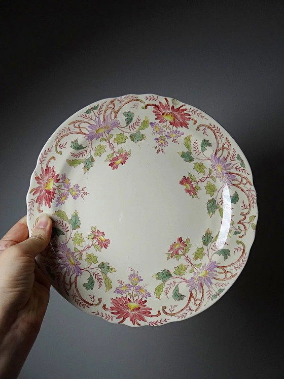 Kurzer antiker Longchamp Ständer mit polychromen Gänseblümchen aus Steingut. – Geschirr, Porzellan (photo 4 of 11)