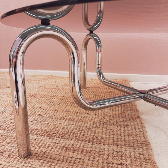 Image 1 of Curved tubular chrome coffee table with round glass top