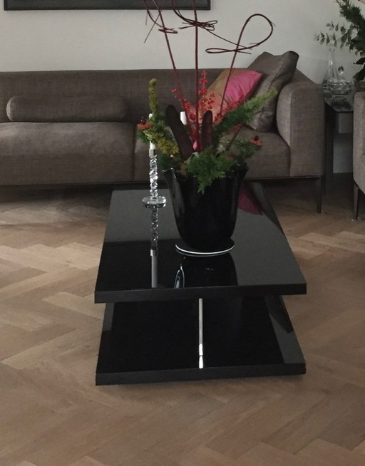 Designer coffee table in black high-gloss lacquer finish