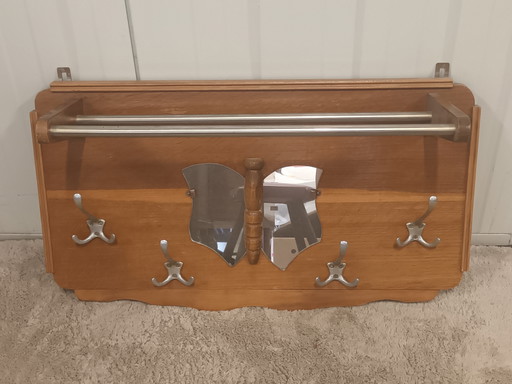 Vintage wooden coat rack with butterfly mirror
