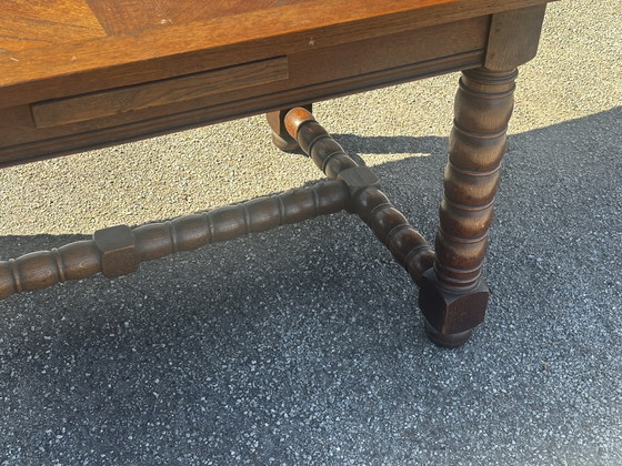 Image 1 of Table en chêne massif à rallonges, pieds tournés XIX e siècle 