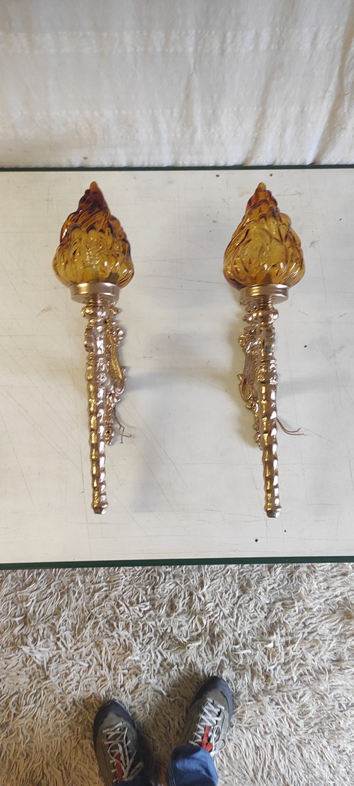 Torch-style wall sconces in gilded cast aluminum and glass - mid-20th century