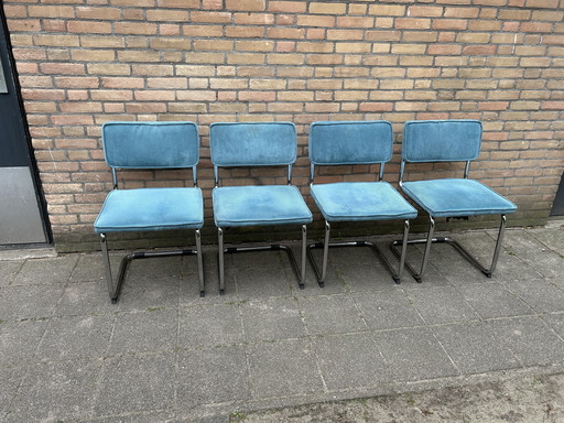 4 Blauwe Ribstof Stoelen