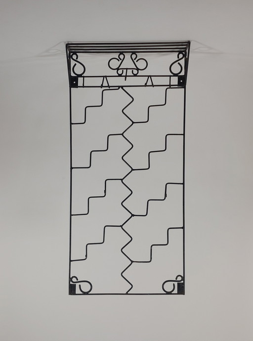 Esclusivo appendiabiti decorativo da parete saldato in acciaio strutturale.