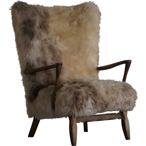 Poltrona vintage danese con schienale alto in rovere e lana d'agnello, anni '50