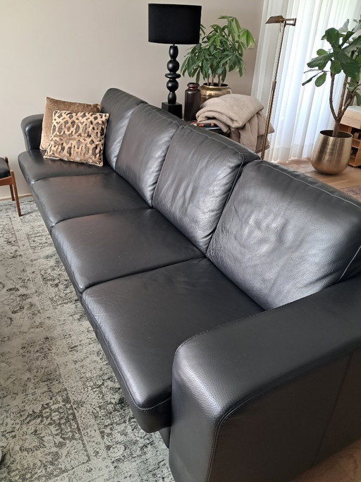 Beautiful black leather 4-seater sofa