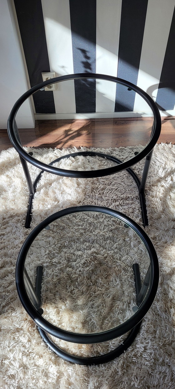 Image 1 of Post-Modern tubular frame nesting tables in black.