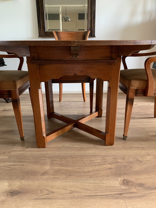 Schuitema dining table and 4 chairs.