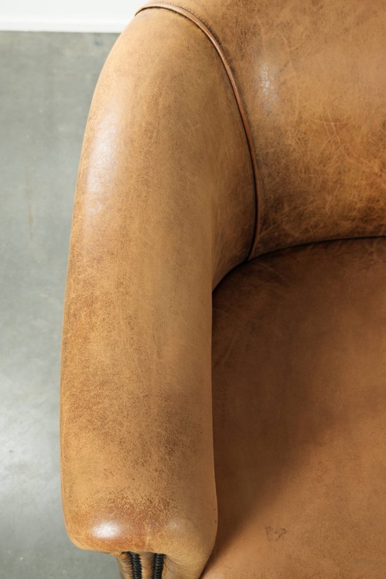 Image 1 of Karaktervolle schapenleren 2 zits bank met een mooie vintage look