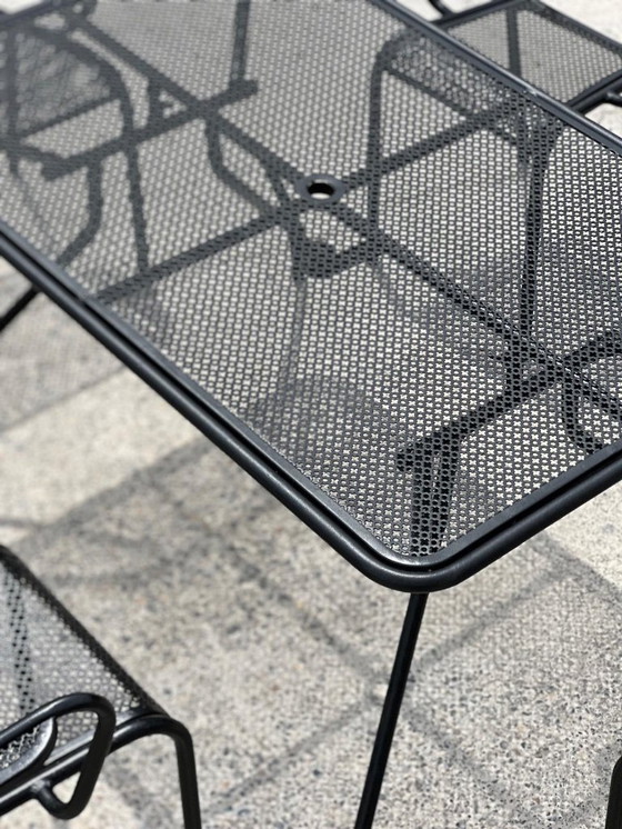 Image 1 of Set of 6 armchairs and table, in perforated metal in the style of Mathieu Matégot 1950