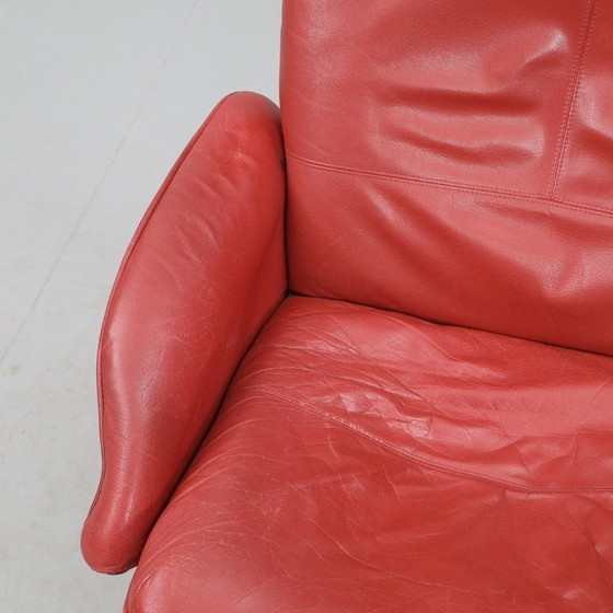 Image 1 of IKEA red leather armchair designed by K. Hagberg – M. Hagberg, from 2000–2010, with a tubular steel tripod base