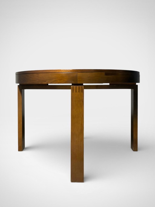 Vintage extendable brutalist round table from the 60s/70s