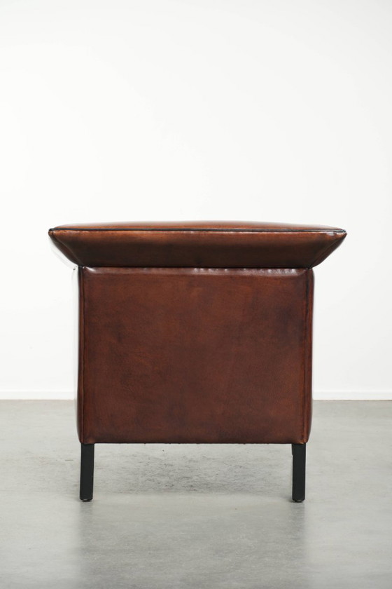 Image 1 of Sheepskin Art Deco design armchair with black piping